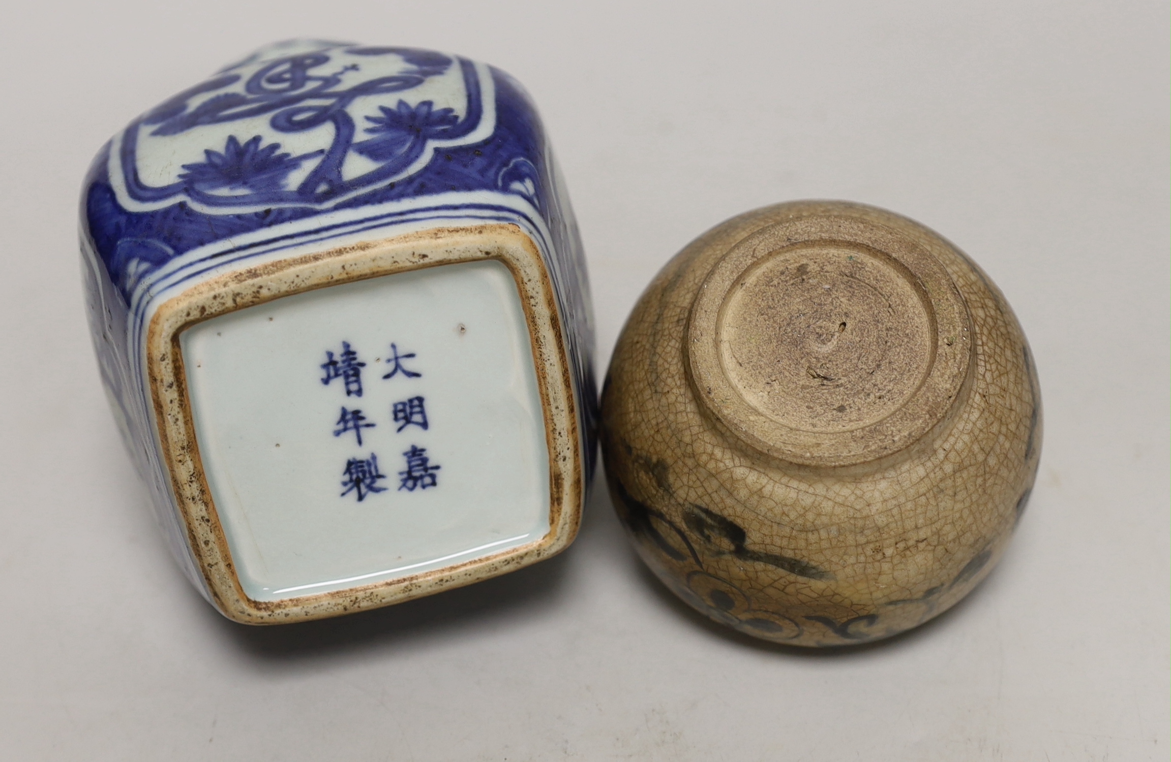 A Chinese blue and white double gourd vase and a smaller crackle glaze jar, tallest 23cm